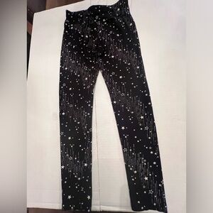 JUSTICE GIRLS LEGGINGS. SIZE 14/16  BLACK WITH STARS AND LINES
